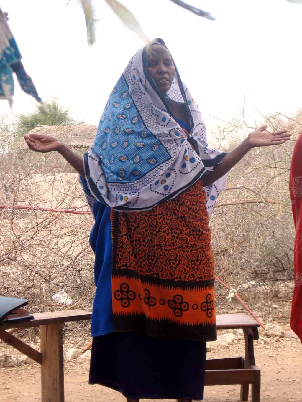 Maasai woman pryaing